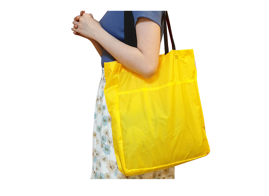 Foldable shopping bag 21009 yellow with model 1