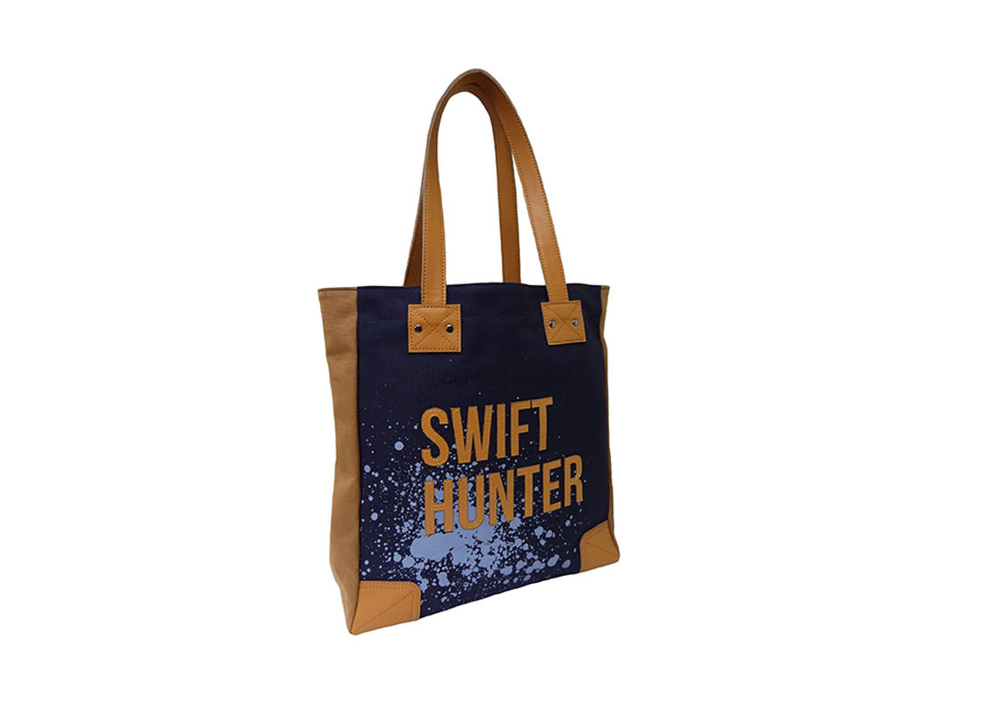 Strong Canvas tote with word swift hunter print