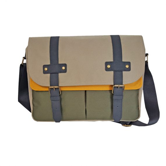 Messenger bag with magnetic button closure